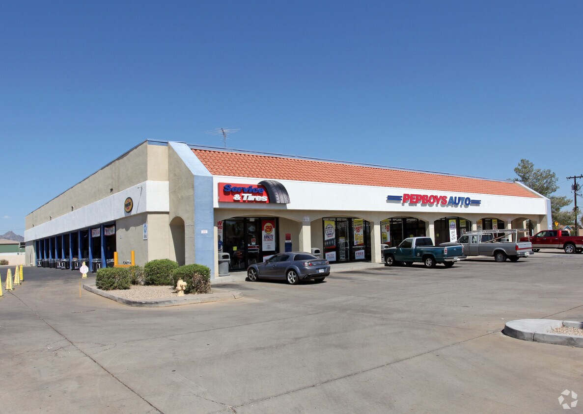 Front exterior of 22,593 SF freestanding former Pep Boys building at 2424 E McDowell Rd, Phoenix, AZ with strong frontage on McDowell Road.